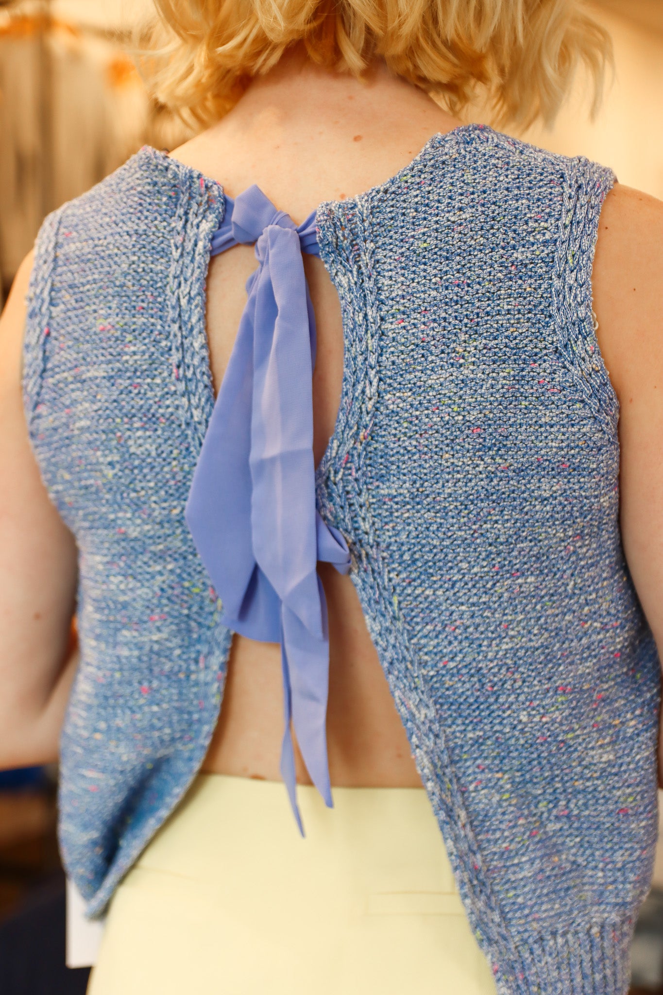 JOHN & JENN “MARTINO” BOW BACK SLEEVELESS SWEATER