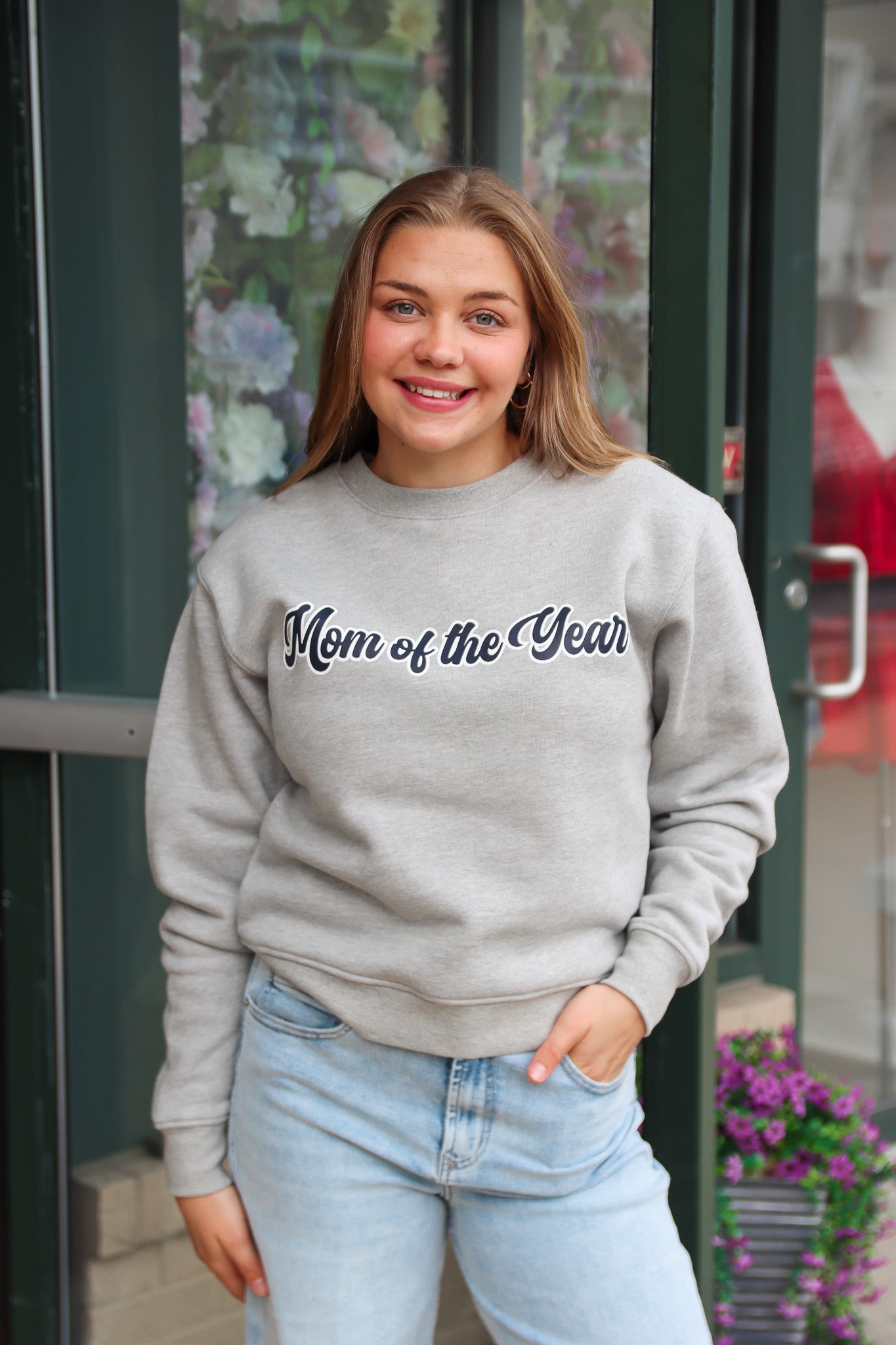 THE MOM OF THE YEAR VARSITY SWEATSHIRT