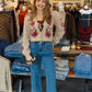 SALTWATER LUXE SLAIDE FLORAL FRONT TIED SWEATER