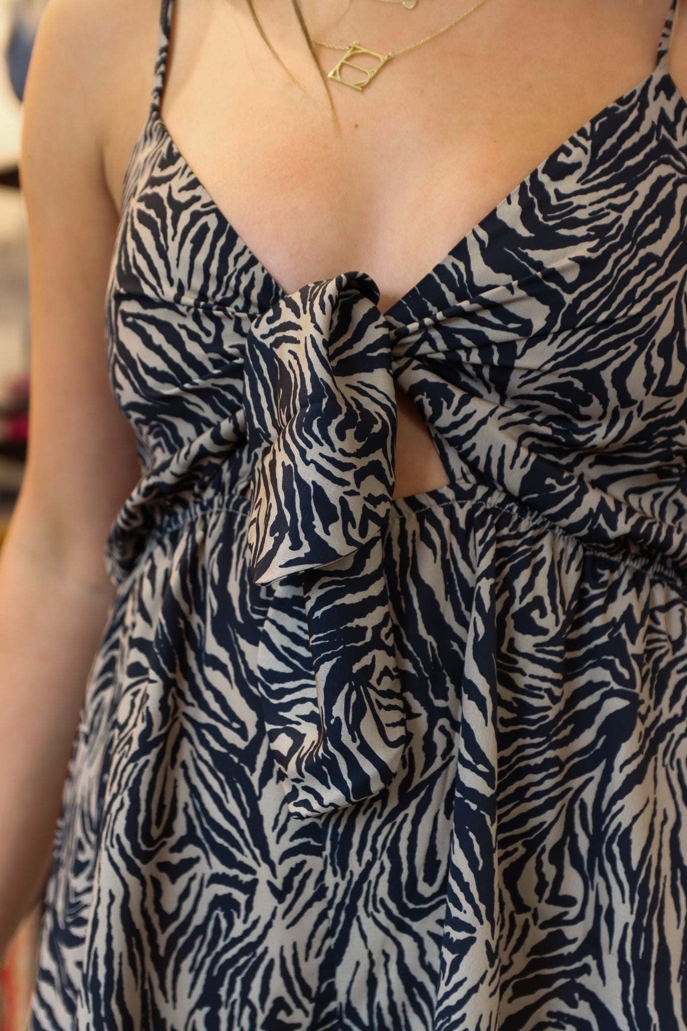 NEEDII SLEEVELESS ANIMAL PRINT ROMPER