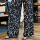 ARIELLA WIDE LEG JUMPSUIT WITH RING BELT