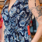 ARIELLA PRINTED SURPLICE BELTED JUMPSUIT