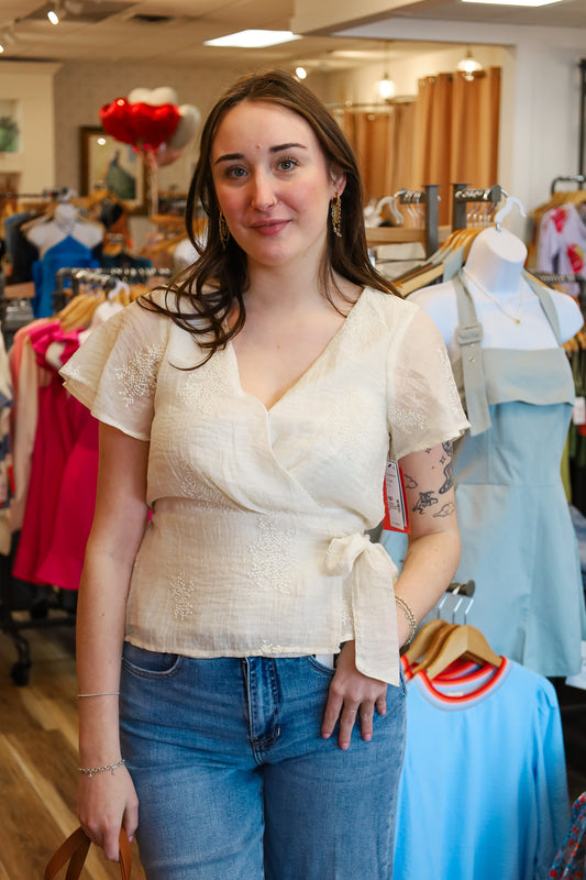 SHORT SLEEVE WRAP FRONT WOVEN TOP WITH TIE