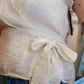 SHORT SLEEVE WRAP FRONT WOVEN TOP WITH TIE