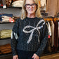 SEQUIN BOW SWEATER