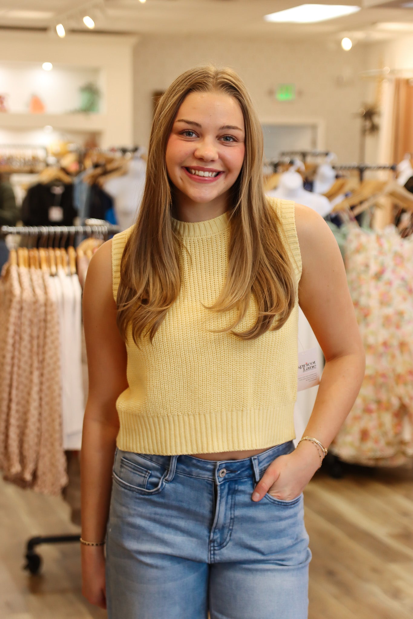 OPEN BACK SLEEVELESS SWEATER